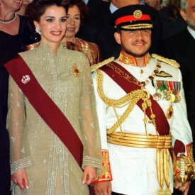 AMM15:JORDAN-KING:AMMAN,9JUN99 - Jordan's King Abdullah and his wife Queen Rania pose during a family photo at the Royal Palace in Amman June 9. Jordanians marked on Wednesday the accession of King Abdullah to the throne in the first public celebrations since the passing away of his father who ruled the country for nearly half a century.        aj/Photo by Majed Jaber       REUTERS